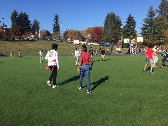students playing flag football
