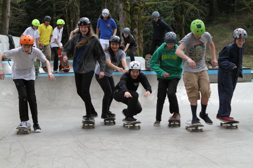 a group of students skateboarding