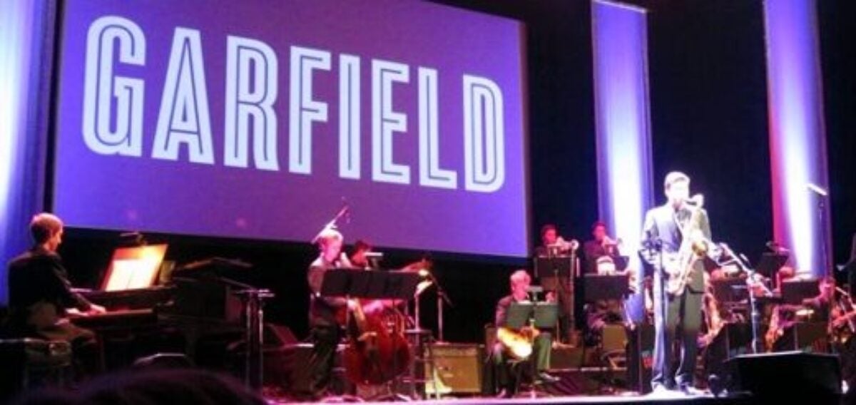 Garfield Jazz students on stage with Garfield Banner