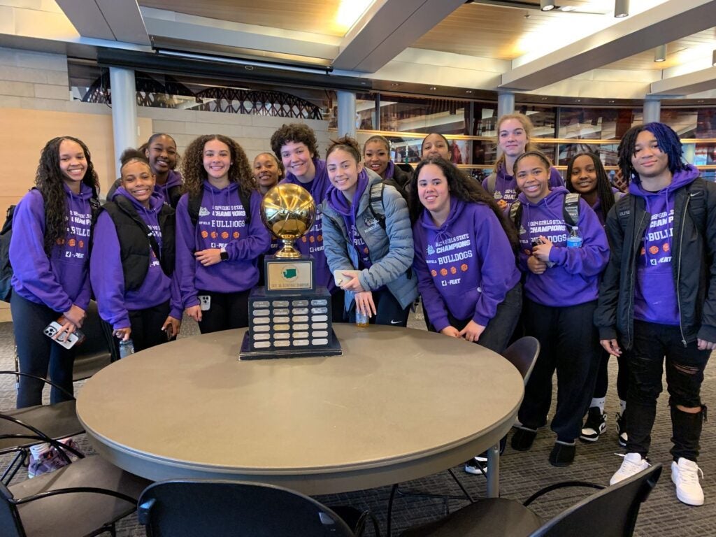 Girls Basketball Team with Trophy