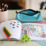Workbook and pencils