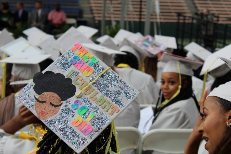 A crowd of students at a graduation