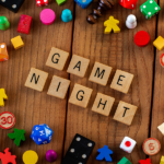 Game night event graphic with game pieces