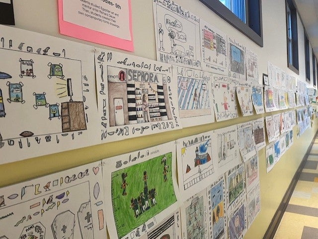 wall view of drawings based on Egyptian art and artist Richard Deuer