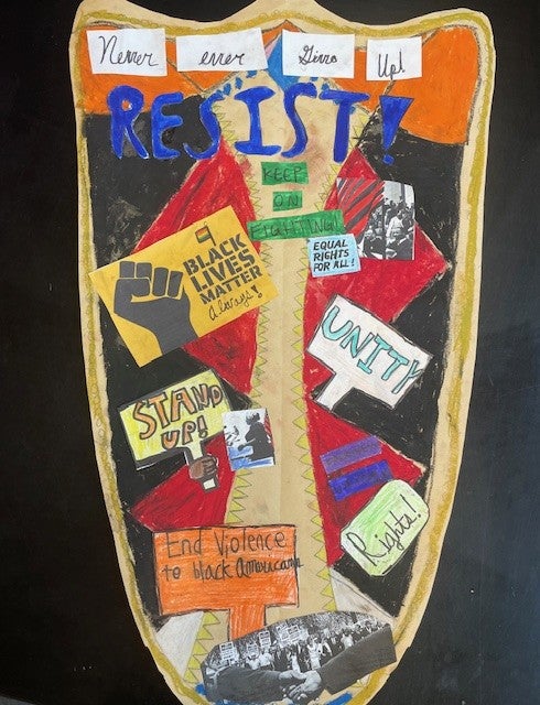 mixed media on the shape of the shield