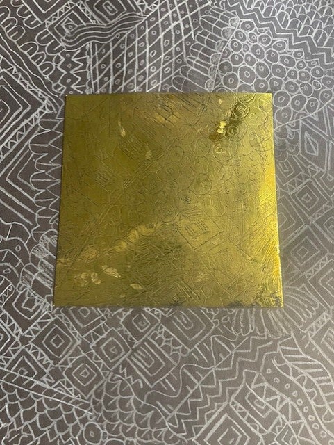 Students studied the history of repousse and neurographic art. Students then used a combination of geometric and organic shapes to engrave zentangles.