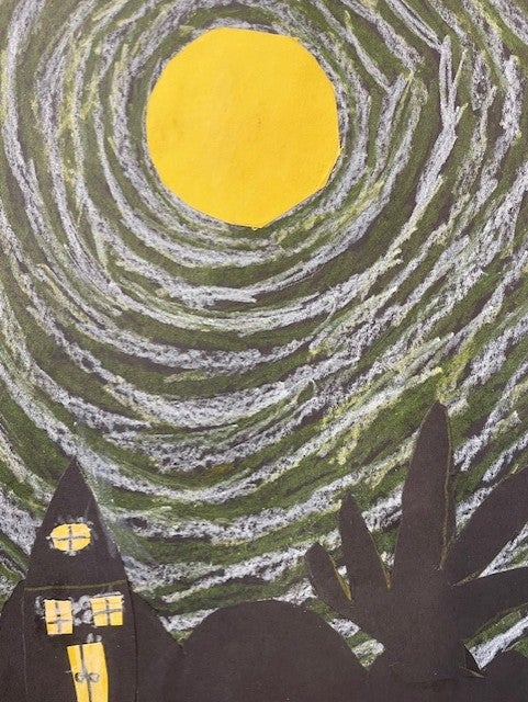 cut paper and pastels used to create landscape of houses and the moon.