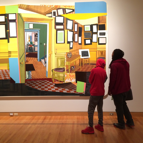 two people look at a painting at an art gallery