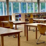 Interior of Hale library with tables and chairs.