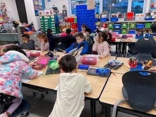 Kindergarten students working at their desks