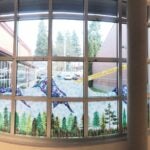 olympic view mural in window of building