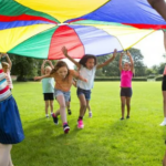 parachute game with playing children