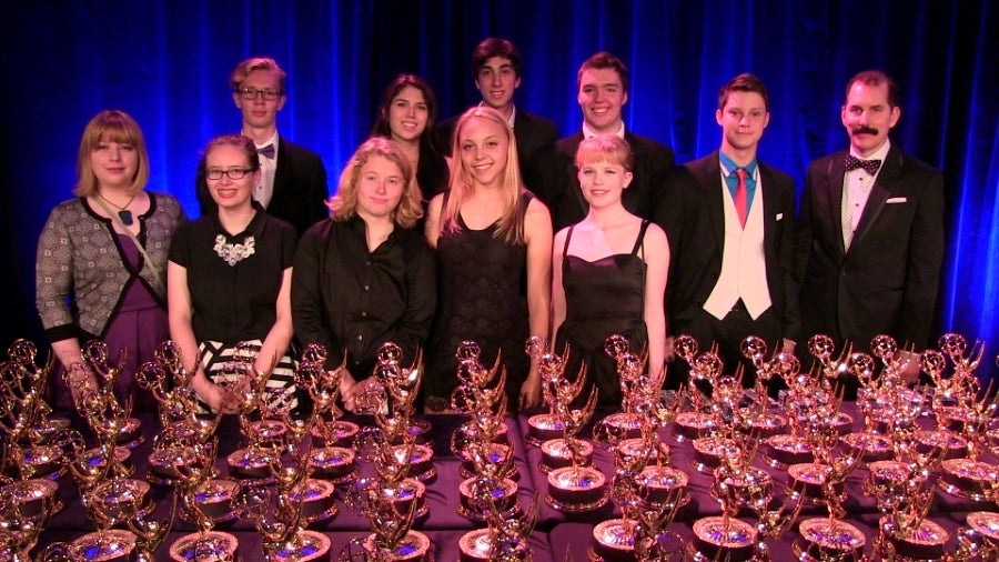 Students with awards and Teacher Matt Lawrence