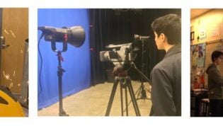 Student with face shield, with Camera and at lighted board