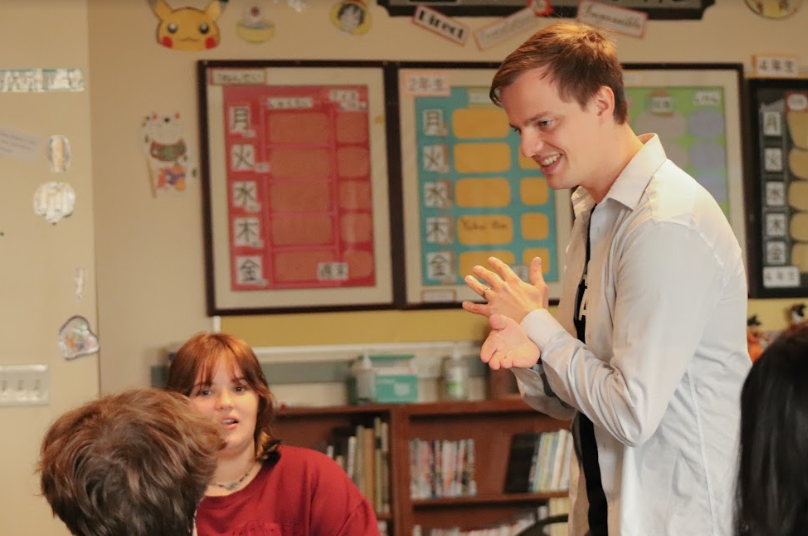 Teacher with students in a classroom