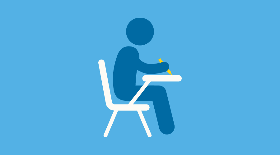 Graphic of a student sitting at a desk and taking a test