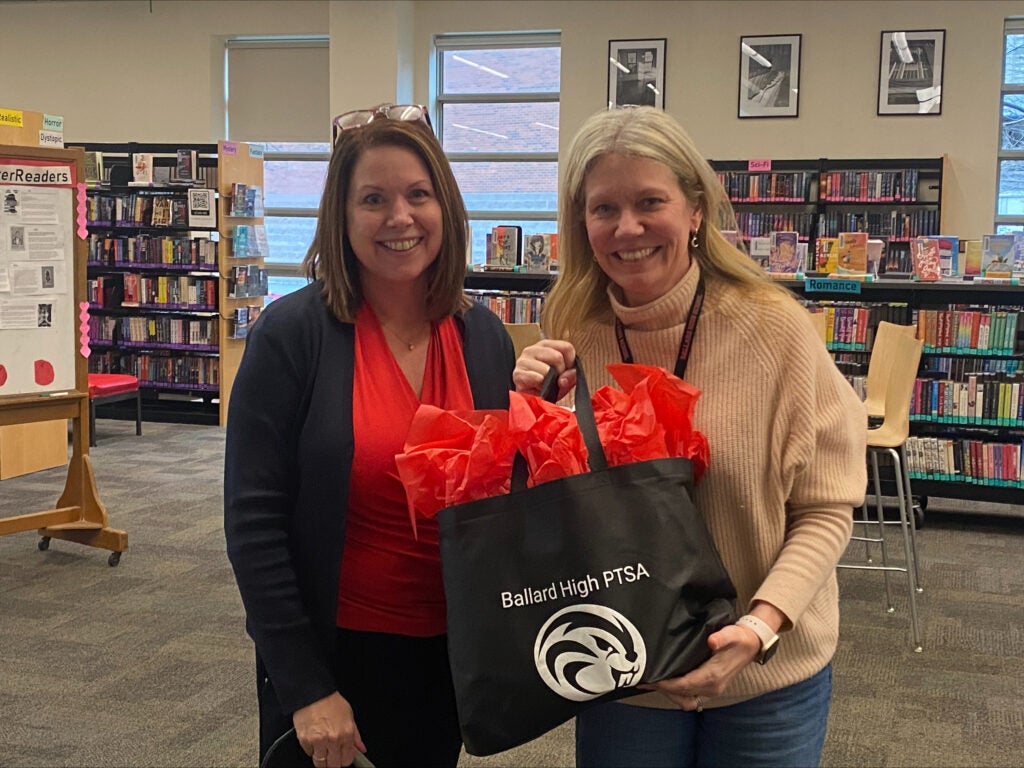 BHS PTSA Membership Chair and Counselor Gail Olson Laing with PTSA Logo tote bag