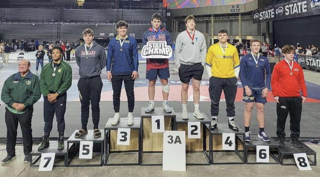 Wrestling Podium with BHS student 