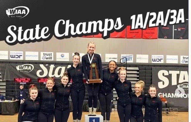 BHS Gymnastics athletes on State Champ Podium