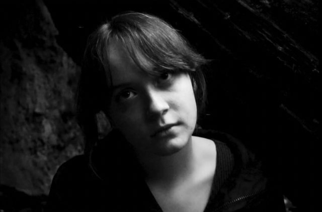 Black and White Photo of a Person. Trapping You Film