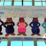 Beavers on a Banner in the Commons Area. Text: Mon, Tue, Wed, Thu, Fri