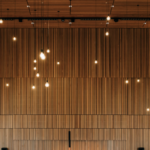 Room with dropped ceiling lights.