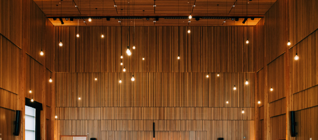 Room with dropped ceiling lights.