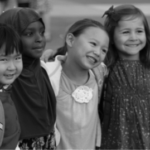 five children pose for a photo